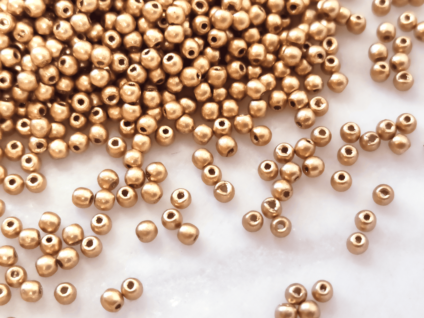 2mm round beads - matt gold