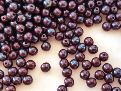 4mm round beads - dark red & purple luster