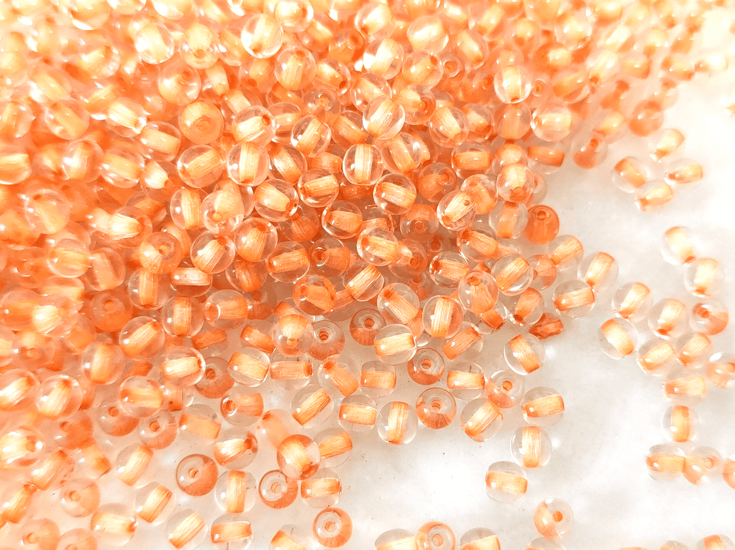 4mm runde Perlen - Farblos & Orange farbgefüllt