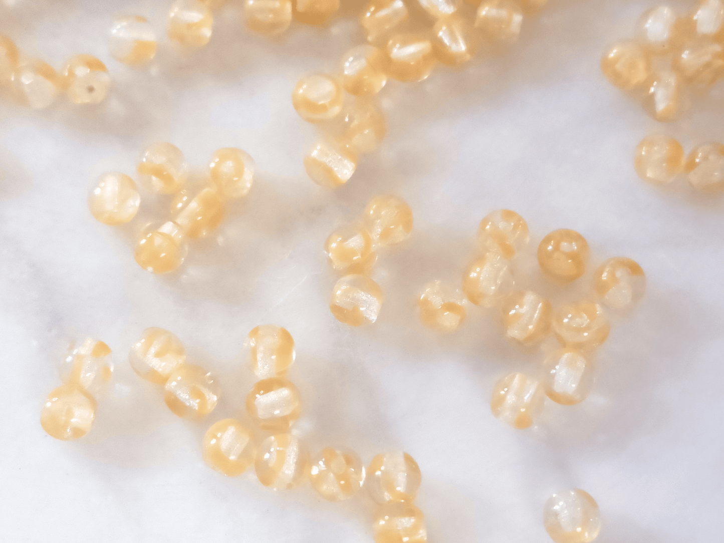 4mm round beads - colorless & beige