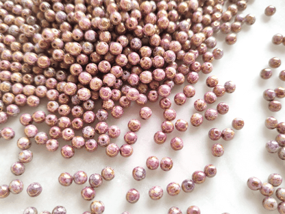 4mm round beads - purple marbled