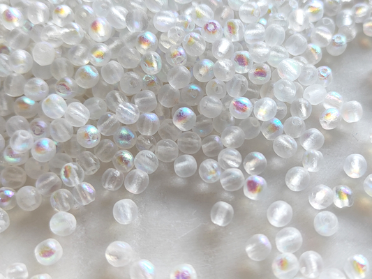 4mm round beads - frosted white iris