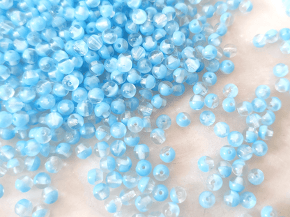 4mm runde Perlen - Farblos & Himmelblau