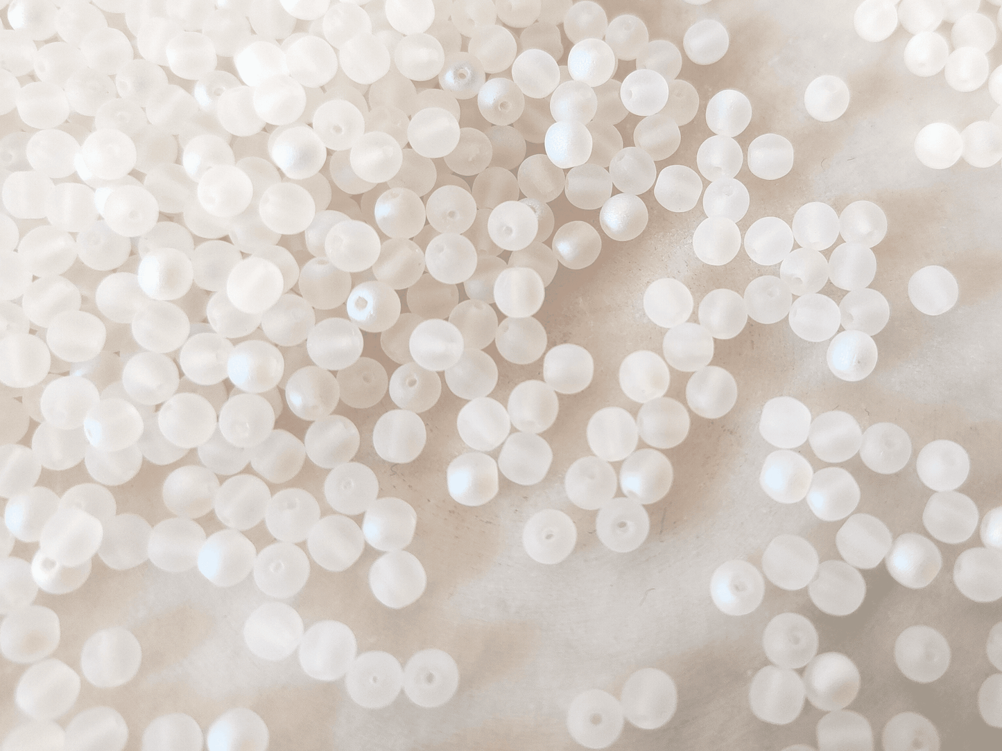 4mm round beads - matt white iris