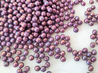 4mm round beads - purple gold luster