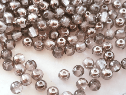 4mm runde Perlen - Farblos & Gunmetal