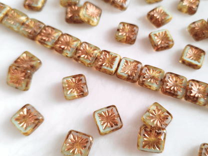 Quadratic kiwi ornament beads 10 mm - colorless & white Picasso