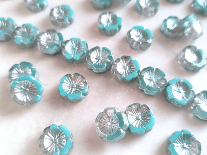 Hawaii flower beads 14 mm - colorless, light blue & silver