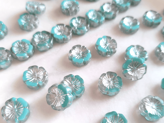 Hawaii flower beads 14 mm - colorless, light blue & silver