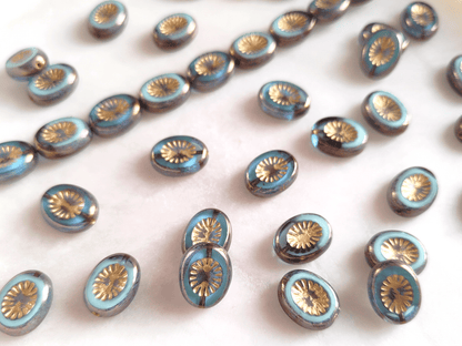 Oval kiwi ornament beads 14x10mm - light blue, purple & gold
