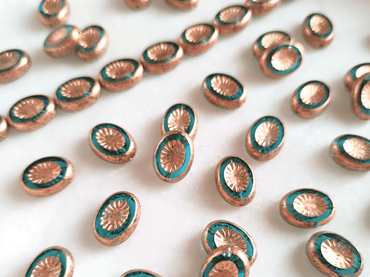 Oval kiwi ornament beads 14x10mm - blue & copper