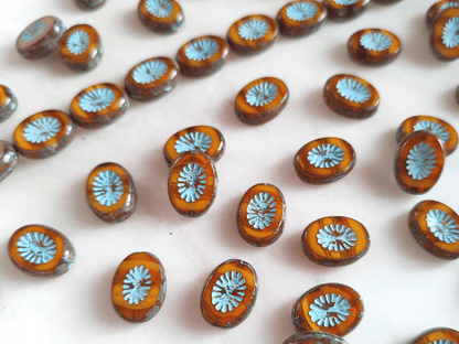 Oval kiwi ornament beads 14x10mm - amber & light blue