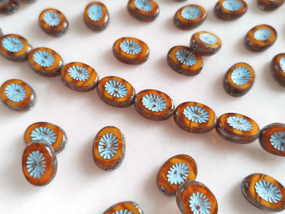 Oval kiwi ornament beads 14x10mm - amber & light blue
