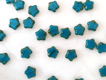 Star beads 8mm - dark Caribbean blue