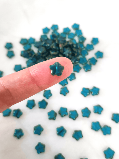 Star beads 8mm - dark Caribbean blue